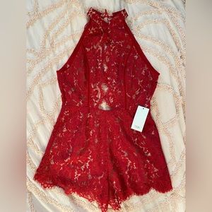 NWT. Red choker, open back, lace romper